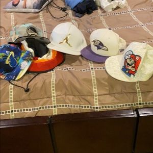 5 SnapBack hats and one sun hat